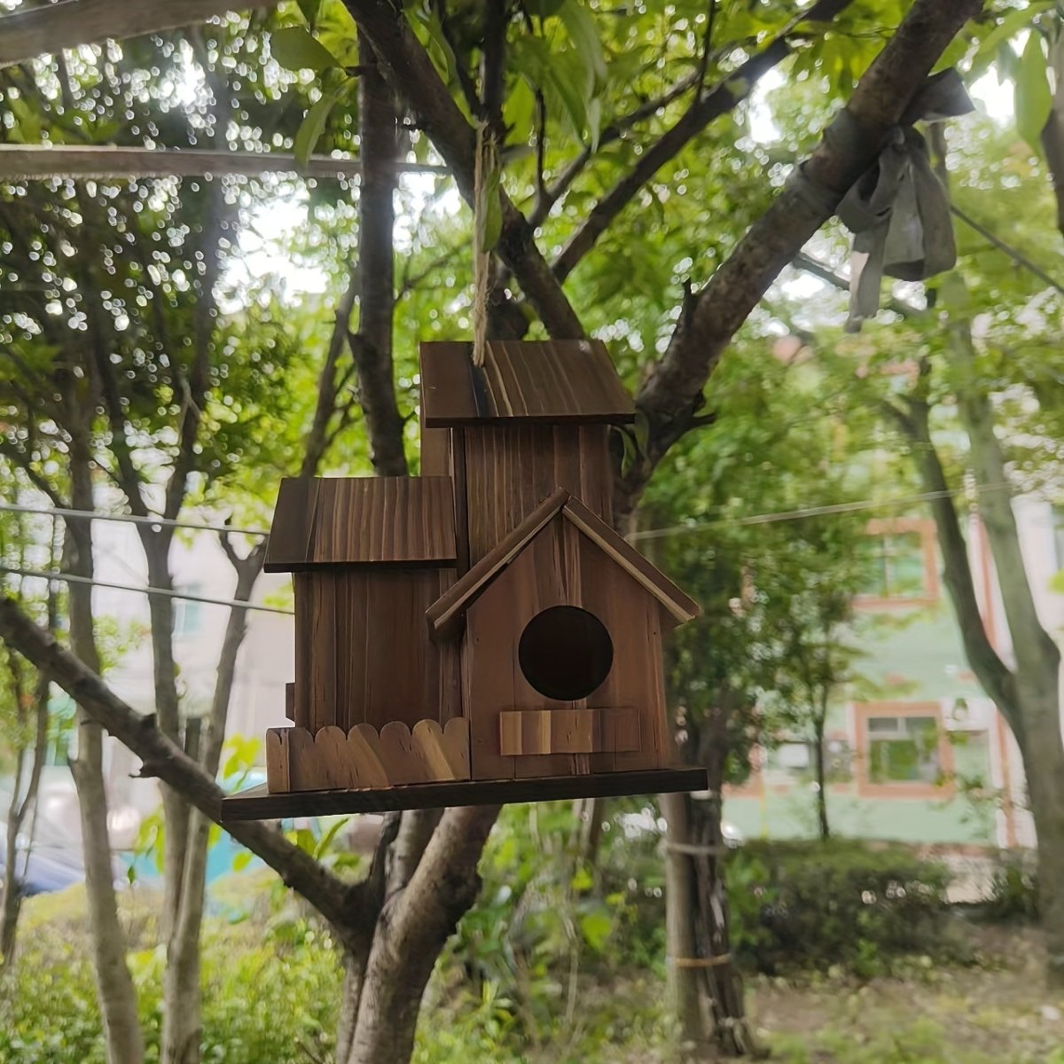 TIMBERROOST – Rustic birdhouse made of solid wood with multiple nesting chambers for outdoor use